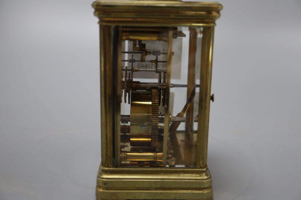 A late 19th century brass carriage timepiece, engraving to the top plate